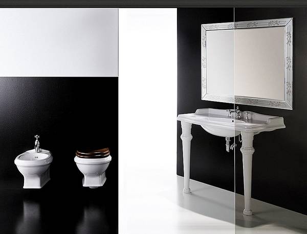 Serie Arcade, Simas Ceramica, Design ufficio tecnico Simas, lavabo consolle con gambe in ceramica, misura 105x56cm, art. AR874 + GB001, finitura bianco, vaso e bidet sospeso, misura 53x38cm, art. AR841 + AR004 + AR843, finitura: bianco con sedile in noce